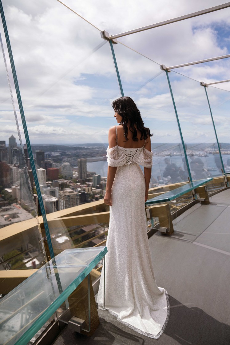 A romantic wedding dress made of beaded guipure that impresses with its tenderness and elegance.-6